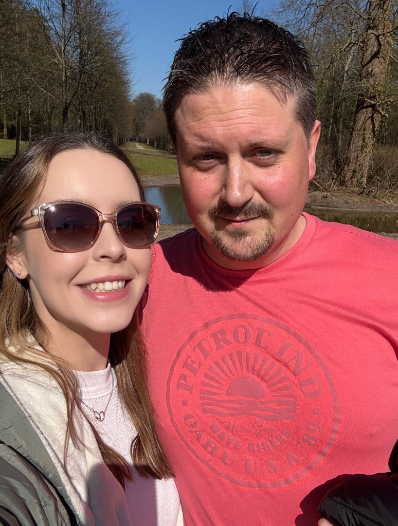 A photo of us together on a sunny day